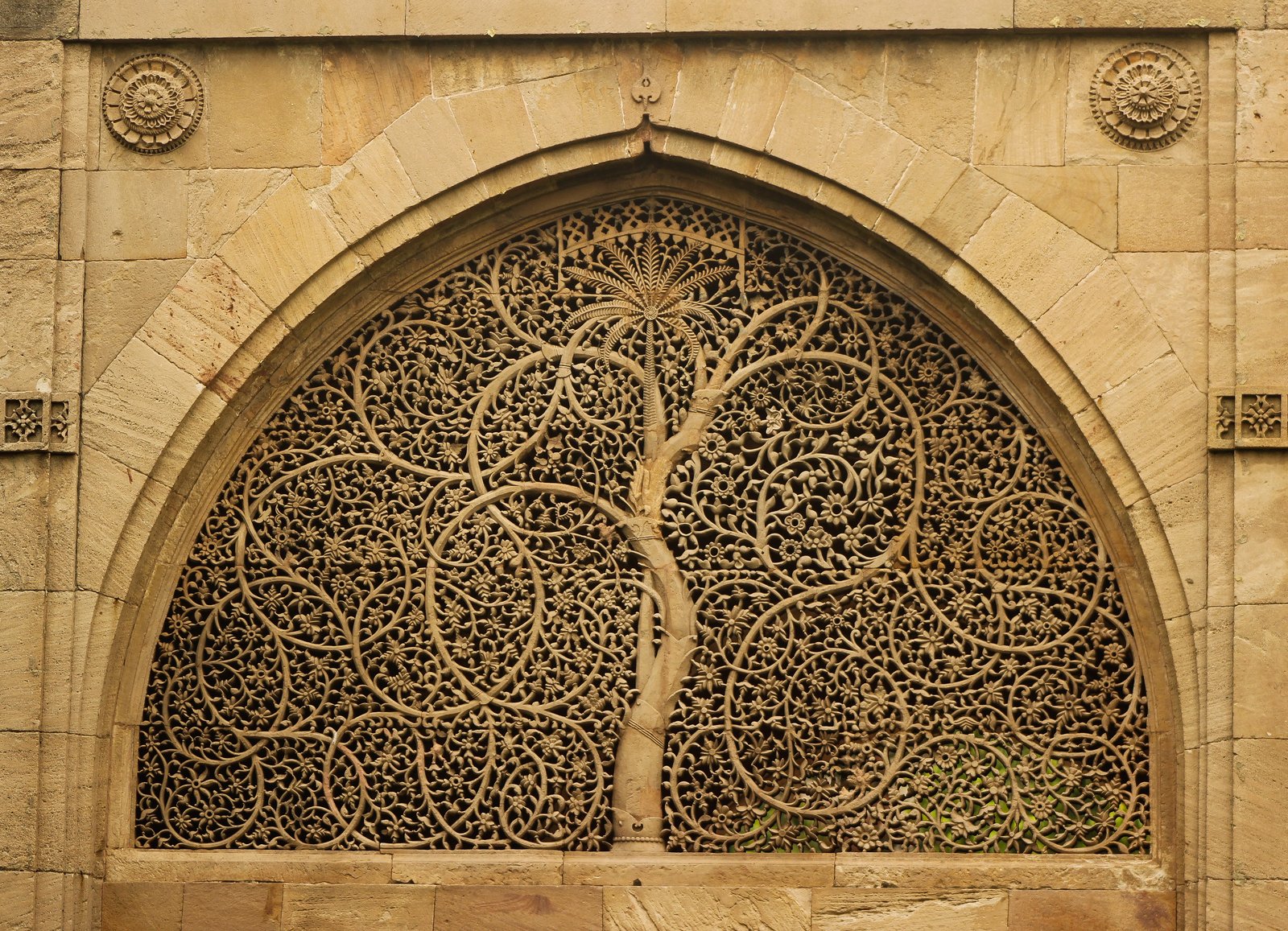 The carved stone jali screen of Sidi Saiyyed Mosque, Ahmedabad, its tree-of-life tracery