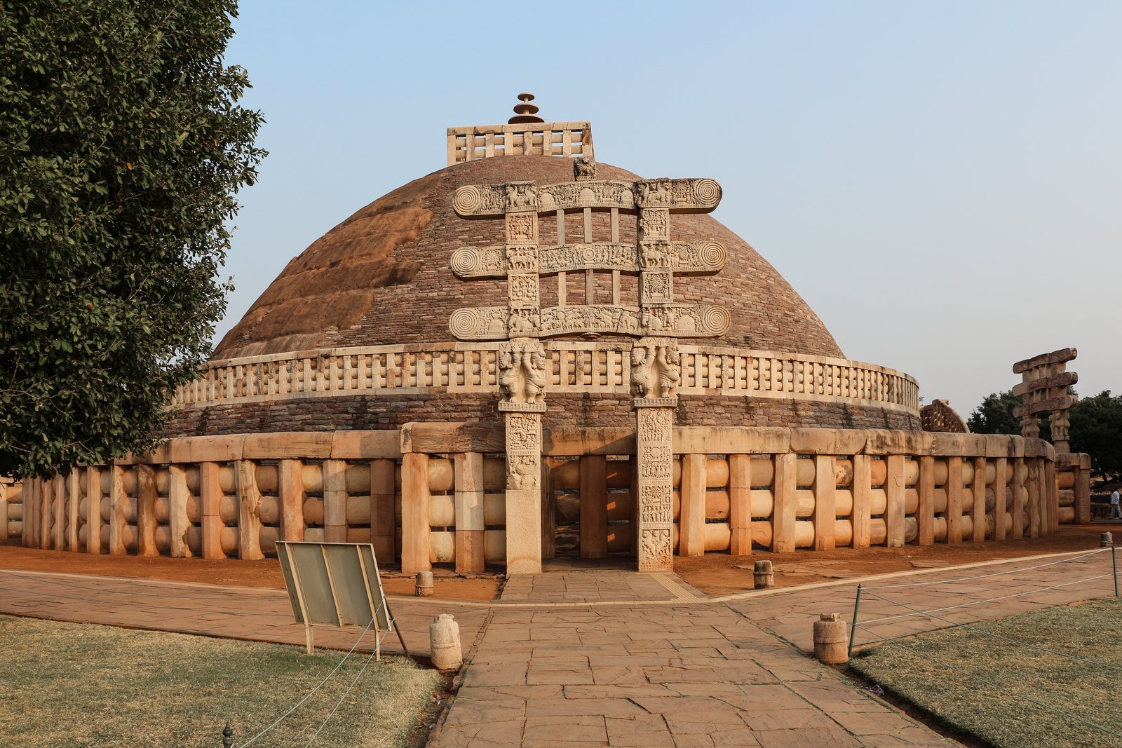 The Great Stupa at Sanchi, its stone dome and carved torana gateway