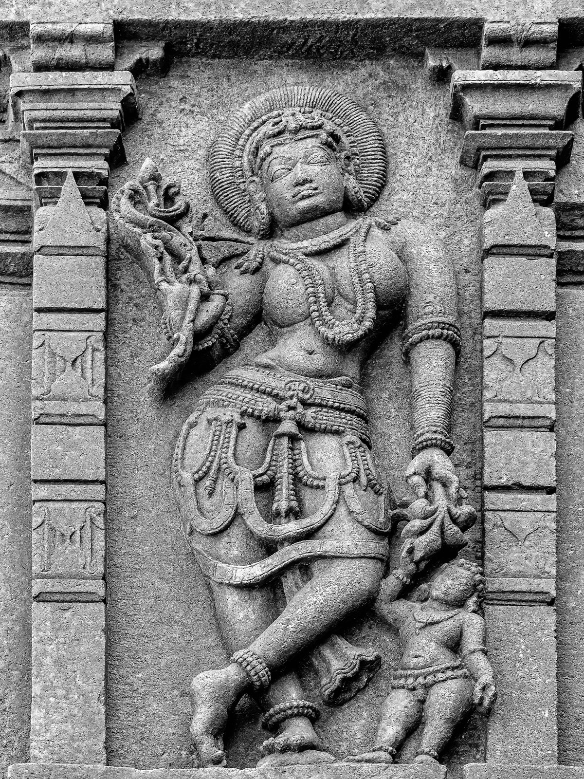 A carved bracket figure, a shilabalika, on the Chennakeshava Temple at Belur