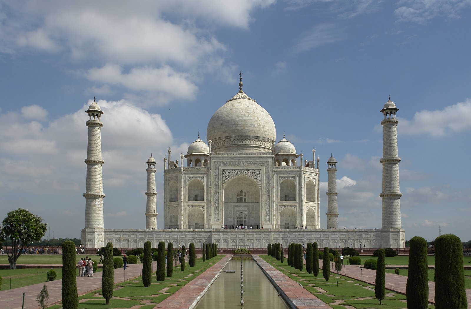 The Taj Mahal at Agra, its white marble dome and four minarets seen across the garden water channel