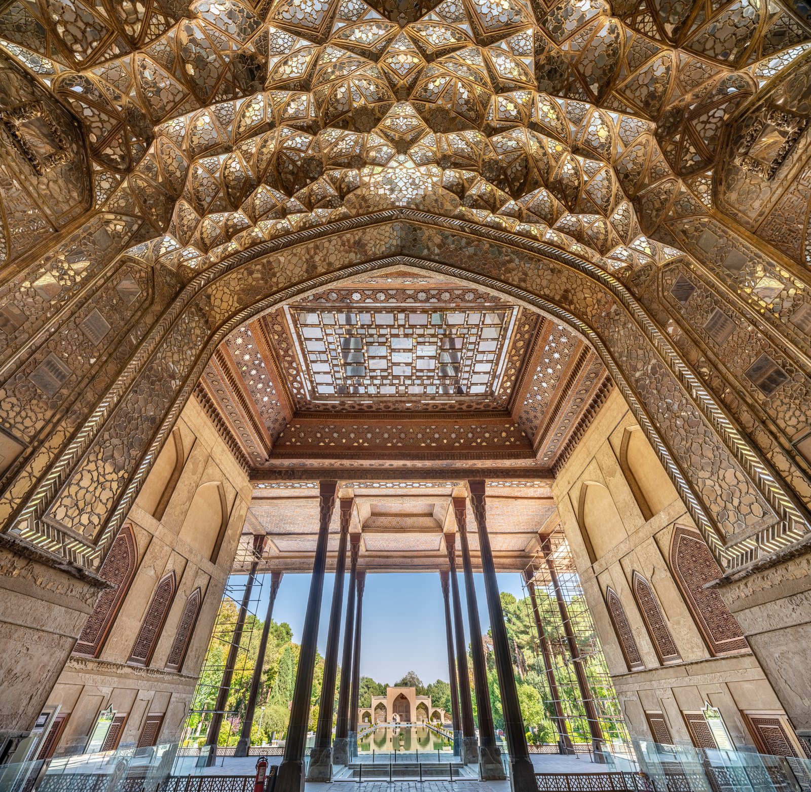 The Chehel Sotoun palace in Isfahan, its wooden columns reflected in a long pool