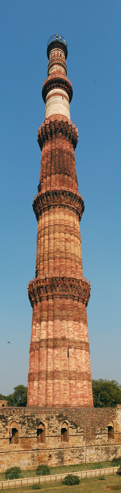 The Qutb Minar and the screen wall of the Quwwat al-Islam Mosque in Delhi