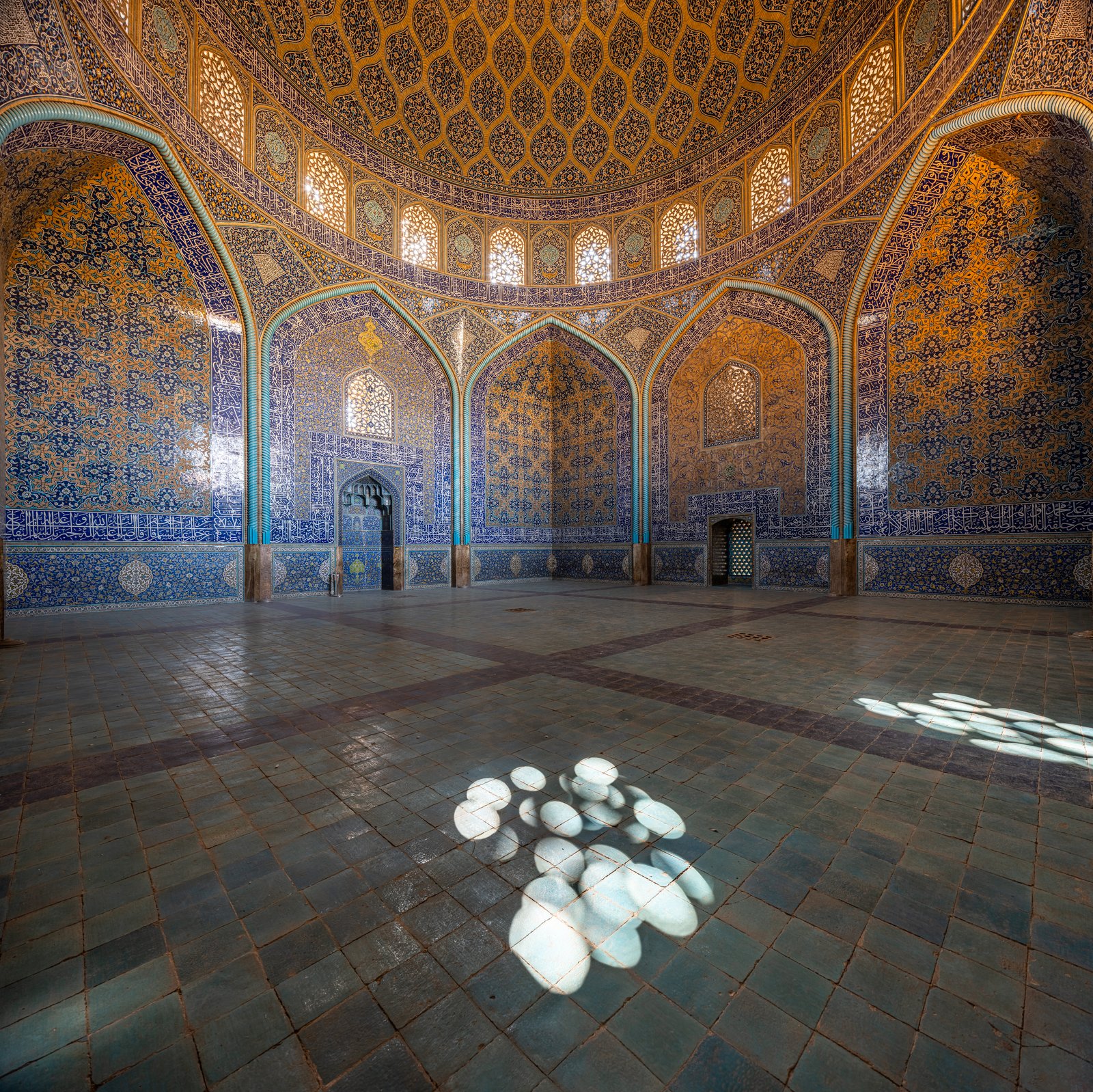 The dome of Sheikh Lotfollah Mosque in Isfahan, in cream and turquoise tile