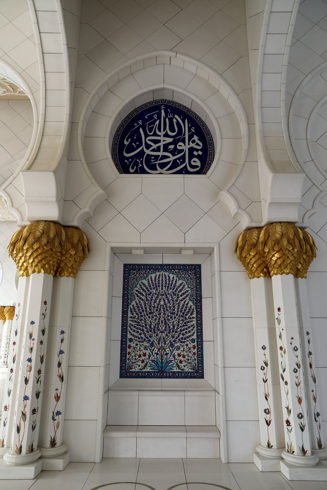 The Sheikh Zayed Grand Mosque in Abu Dhabi, its white marble domes and courtyard
