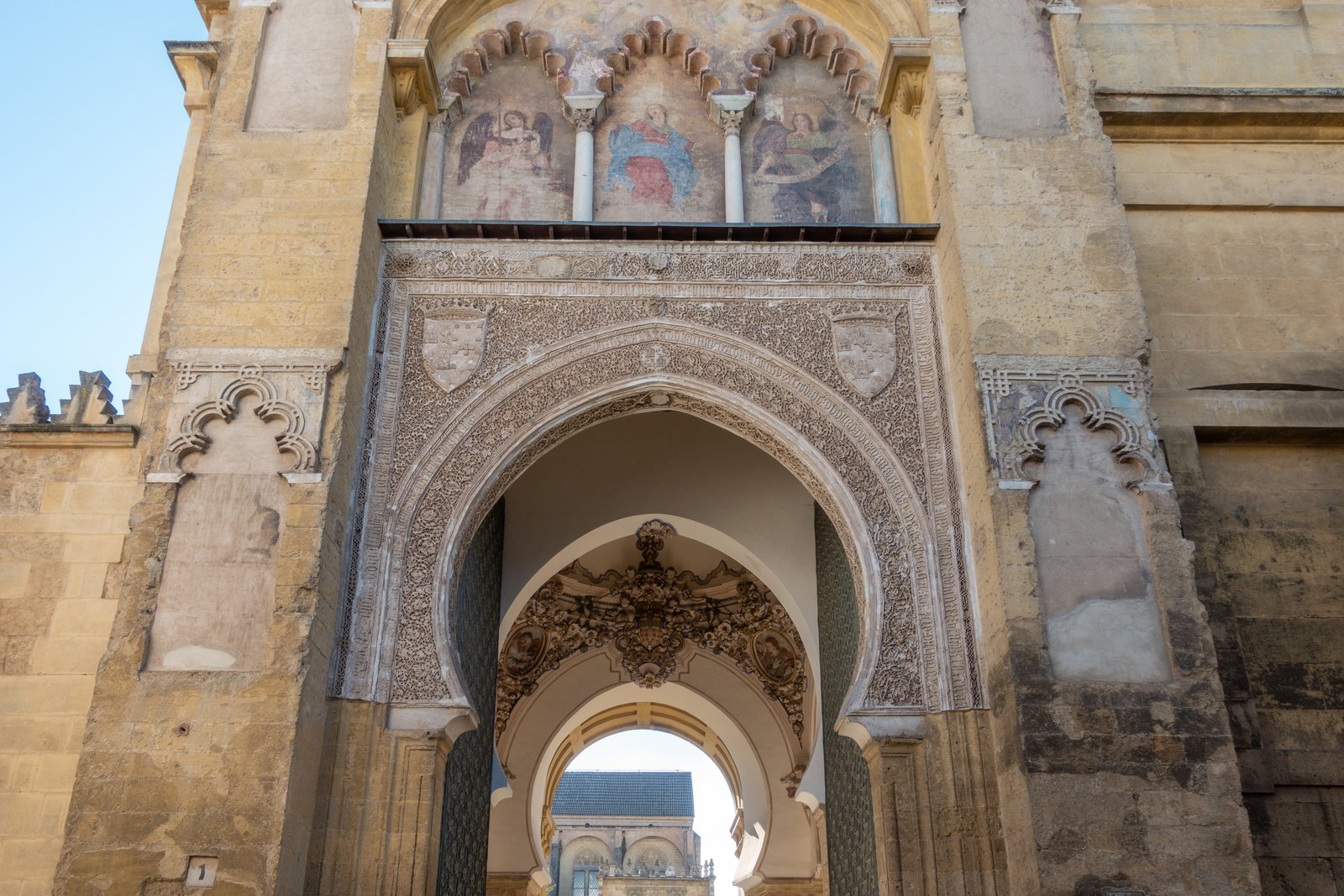 A horseshoe arch in an Andalusi arcade, the first sign of an Islamic building
