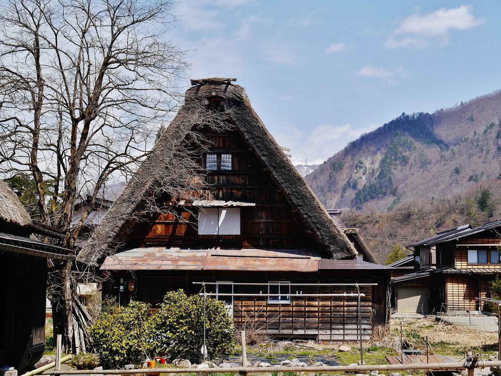 A steep thatched gassho farmhouse at Shirakawa-go in the mountains