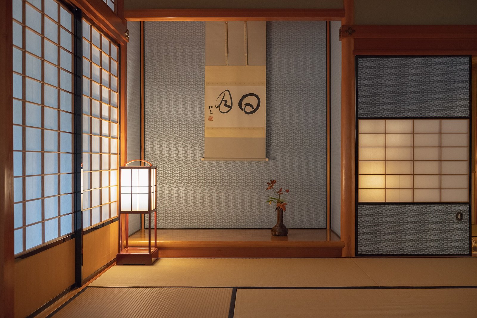 Shoji screens and a tokonoma alcove in a tatami room