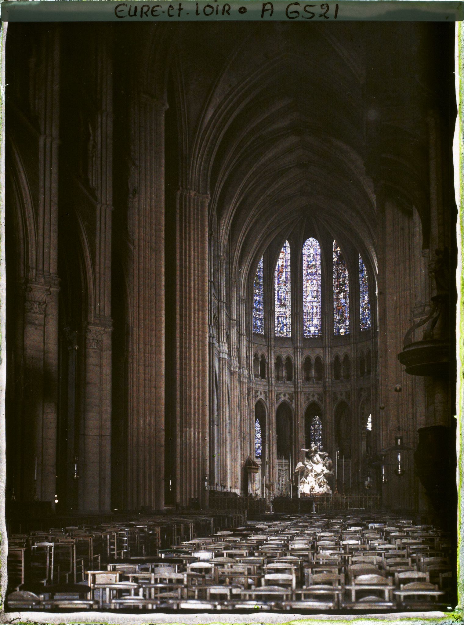 The nave of Chartres Cathedral looking east, in an early colour photograph
