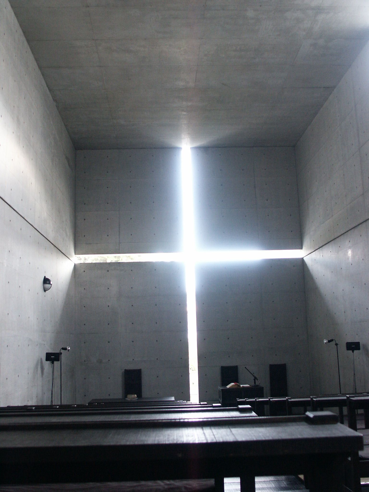 The Church of the Light in Ibaraki by Tadao Ando, its cross of light cut into the end wall