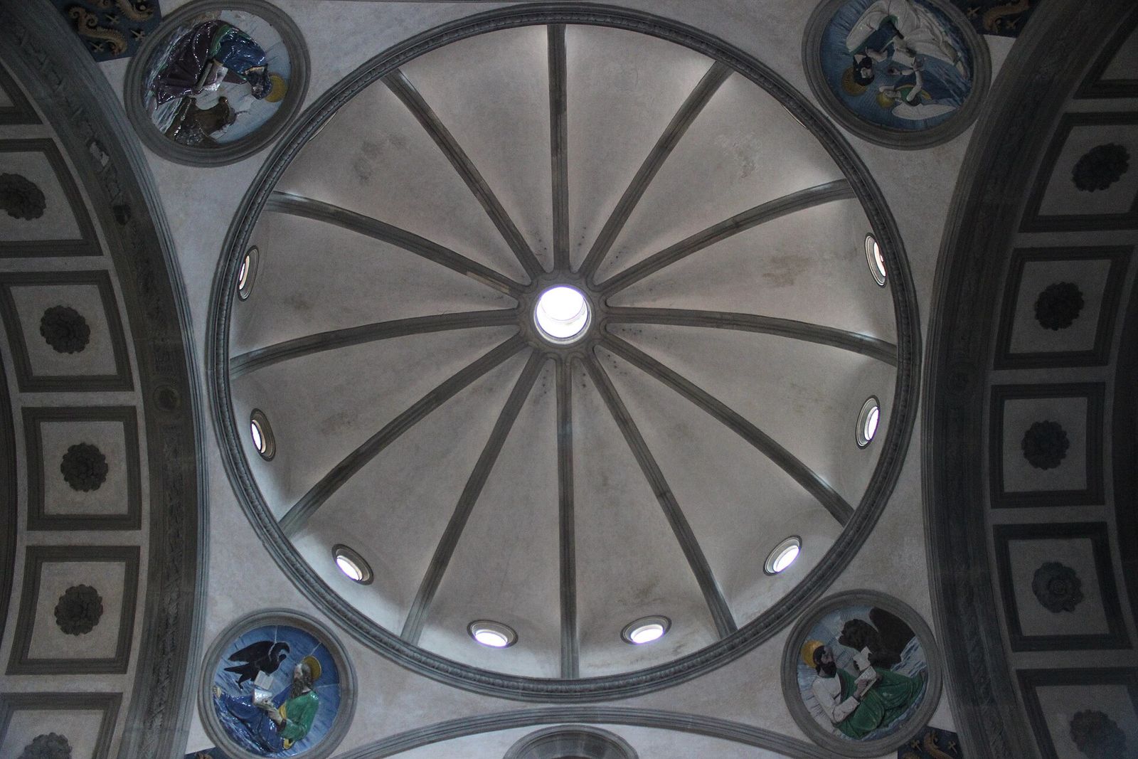 The dome of the Pazzi Chapel in Florence, with its oculus and round windows