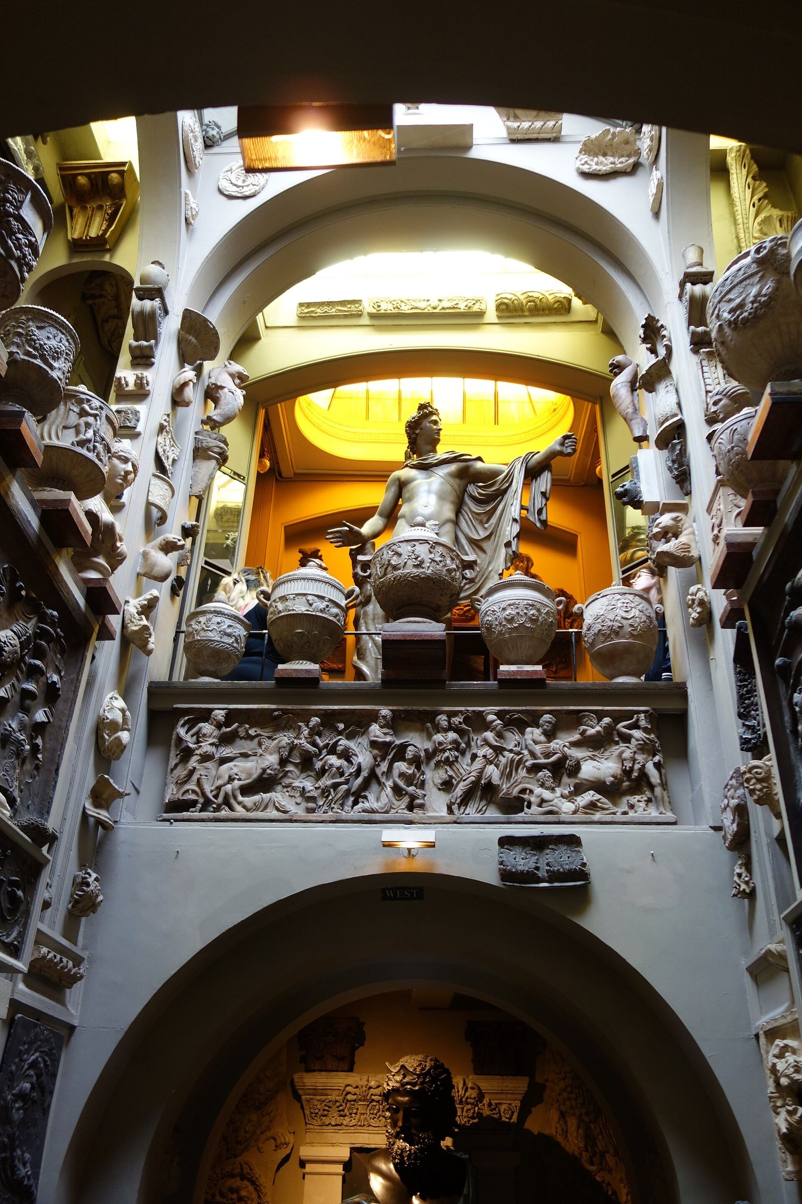 The dome area of Sir John Soane's Museum in London, warmed by light from the glazed dome