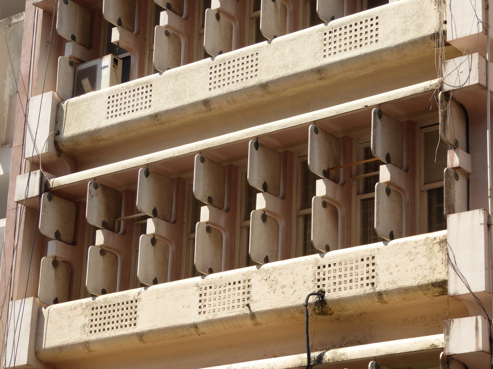 A brise-soleil facade shading a Brazilian modern building