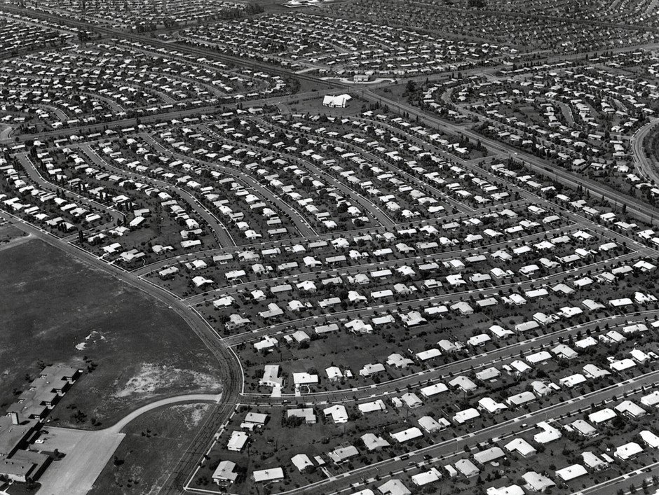 Levittown in its early years, rows of small postwar houses on former farmland