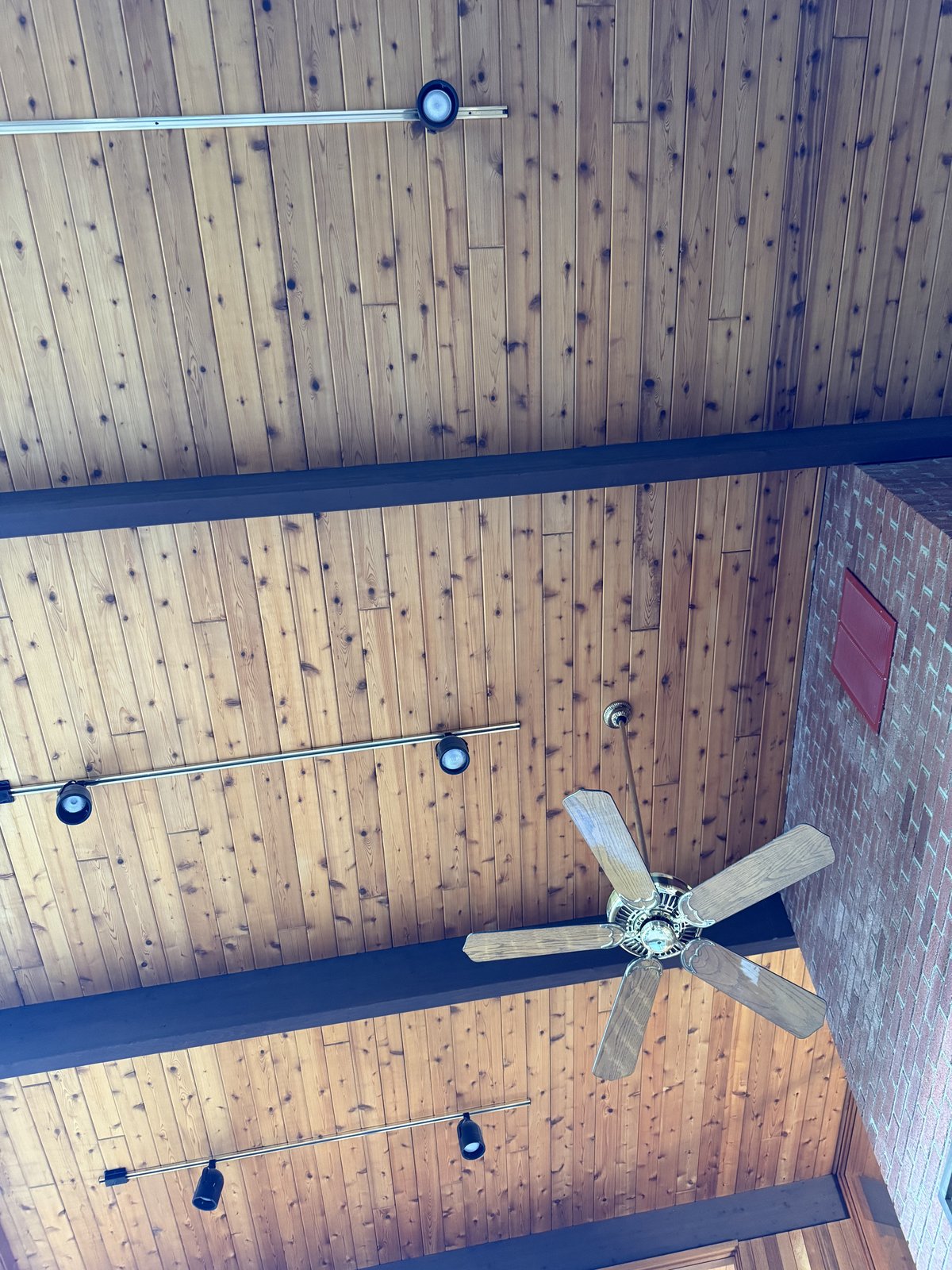 Post-and-beam construction, slender steel or timber columns carrying a flat roof