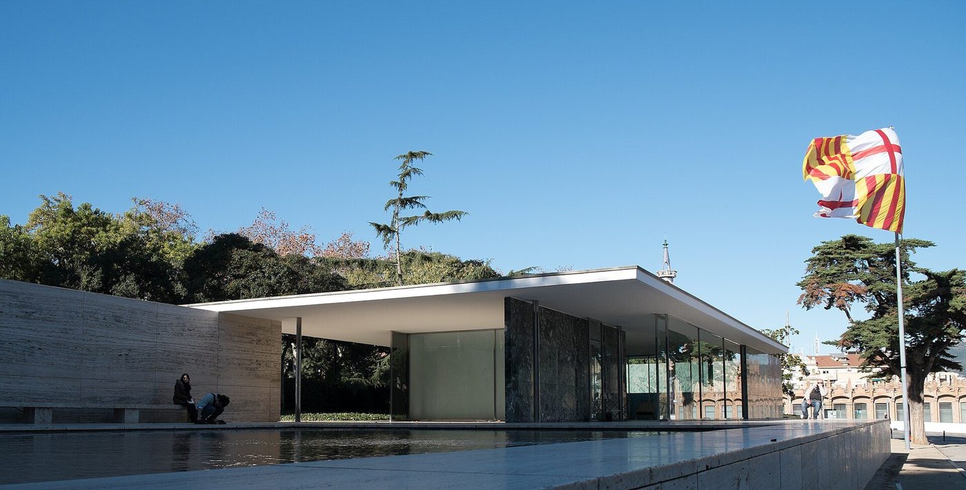 The Barcelona Pavilion: flat roof on chrome columns, marble and glass screens beside the reflecting pool