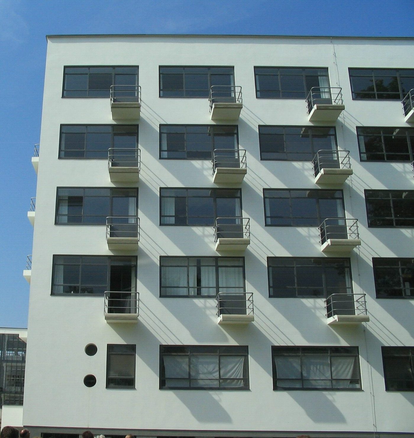 The studio wing (Prellerhaus) of the Bauhaus Dessau, its grid of windows and small balconies
