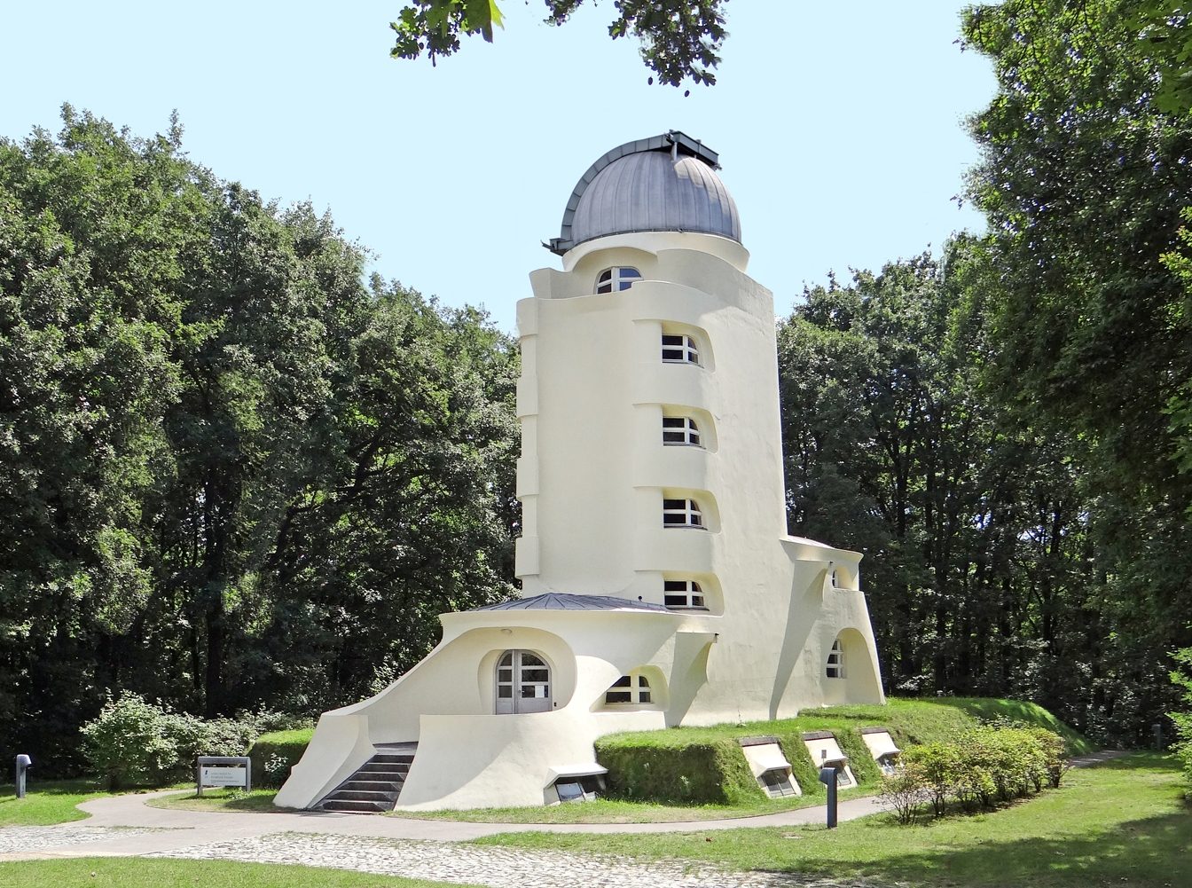 The Einstein Tower at Potsdam, a white sculpted tower among trees
