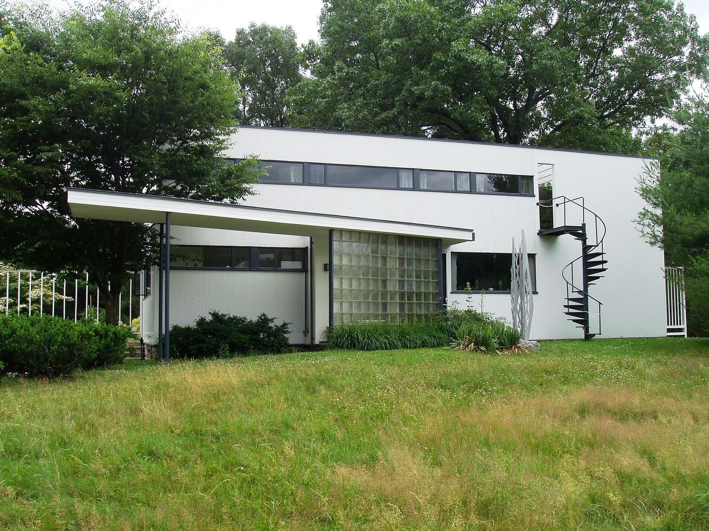 The Gropius House at Lincoln, Massachusetts: a white box with ribbon window, glass block and spiral stair