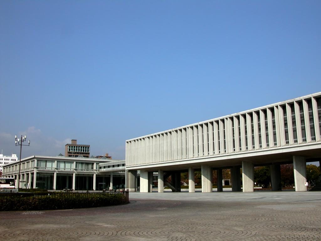 The Hiroshima Peace Memorial Museum: a long slab raised on pilotis above the Peace Park