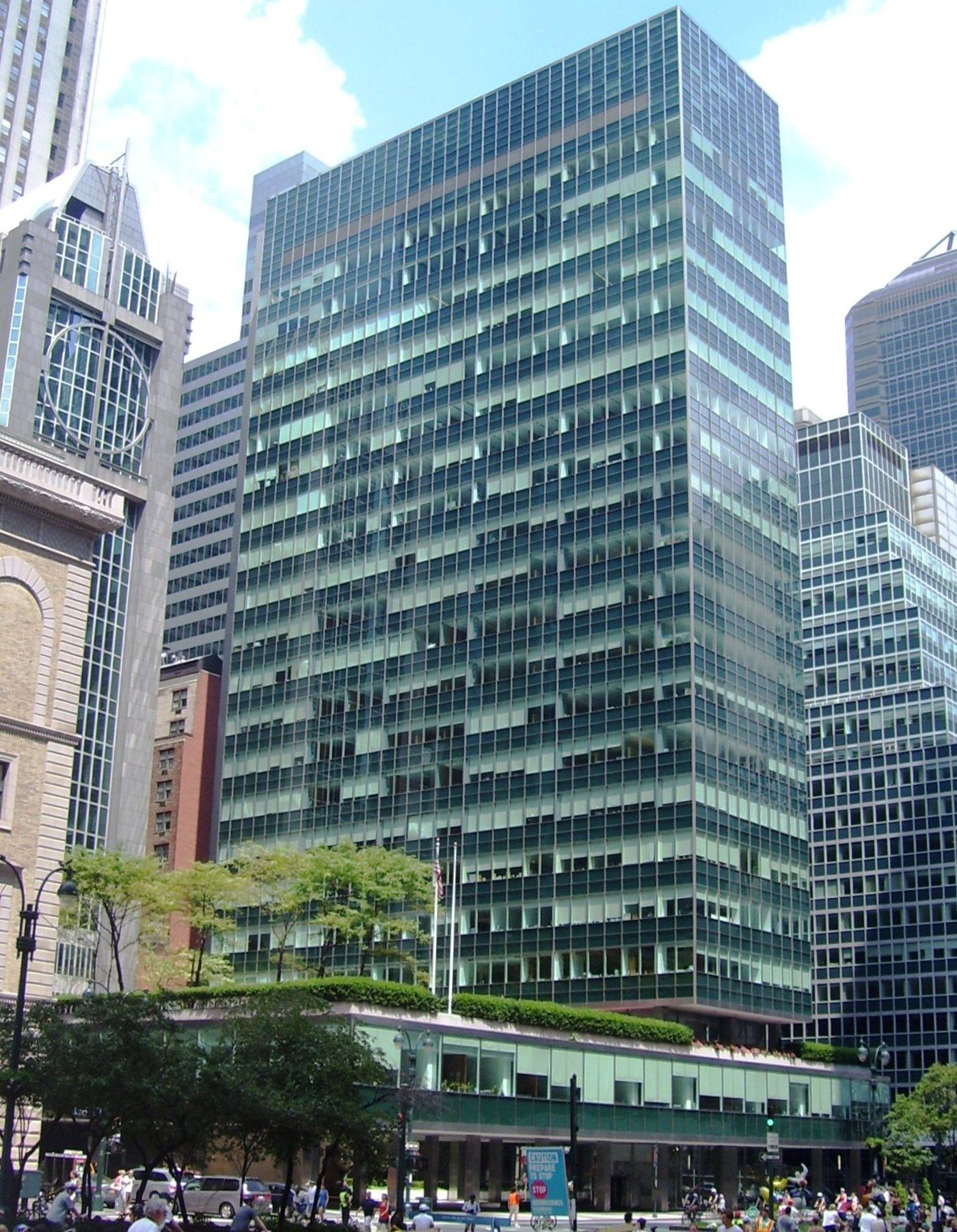 Lever House on Park Avenue: a green glass slab on a low podium above the street
