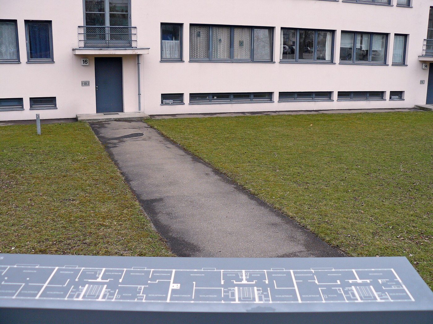 Le Corbusier's house at the Weissenhof Siedlung, Stuttgart: white block on pilotis with ribbon windows