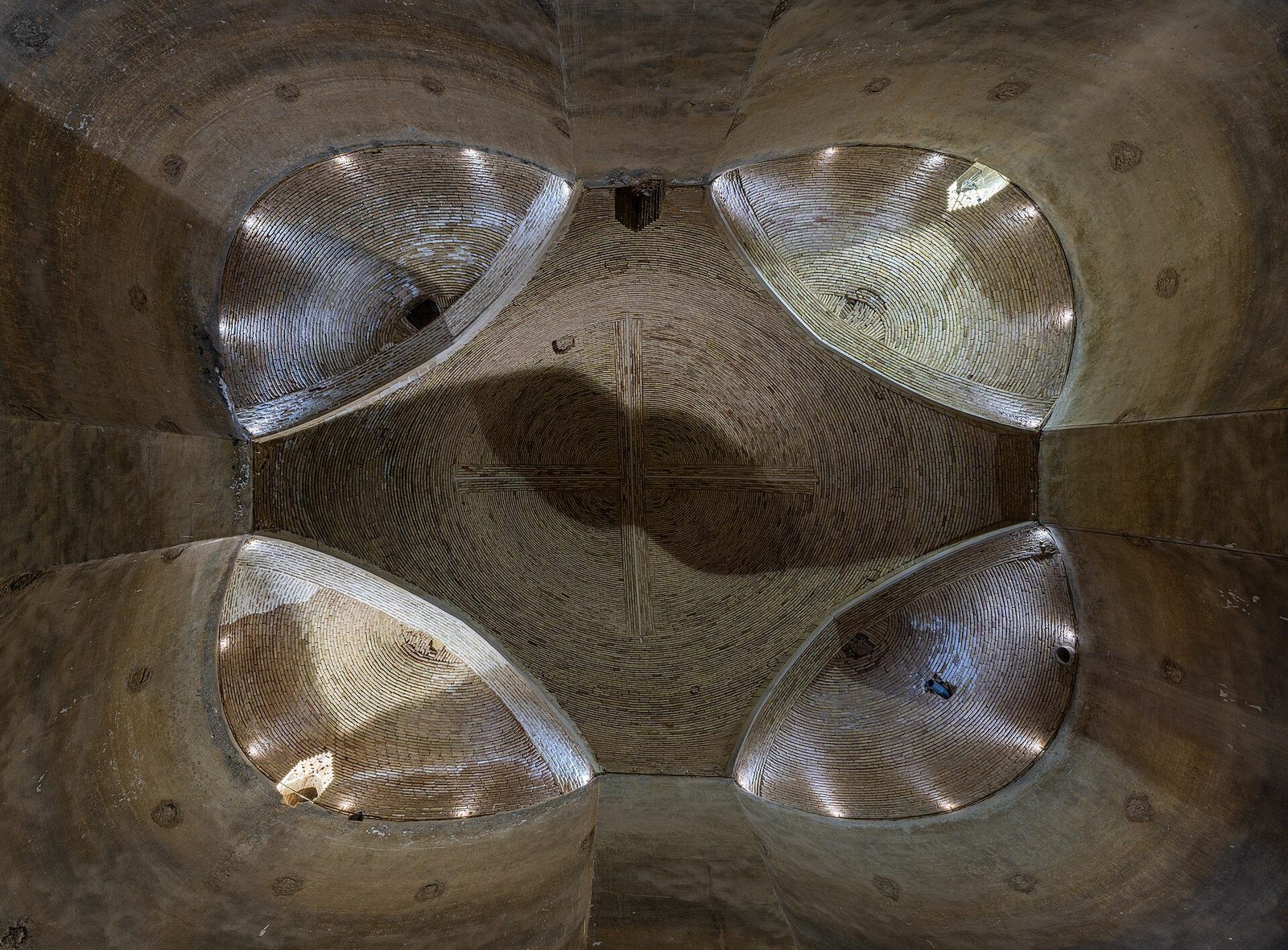 The domed ceiling of the underground ab-anbar at Nushabad, seen from below, its vents opening to the light