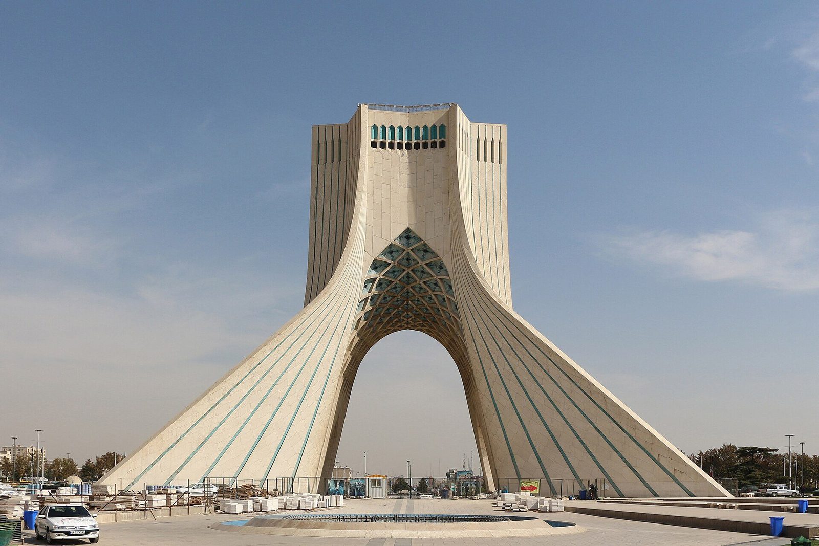 The Azadi Tower in Tehran: the great arch of interlaced concrete ribs rising from its plinth