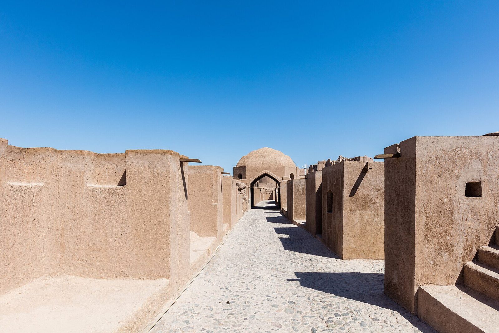 A street inside the citadel of Arg-e Bam: mud-brick walls and lanes within the fortress city