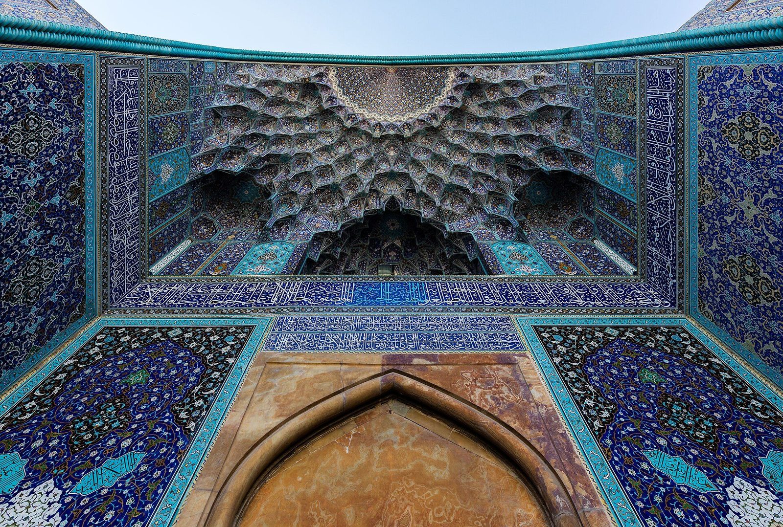 Glazed tile mosaic on the portal vault of the Shah Mosque in Isfahan: floral panels in turquoise, cobalt and yellow