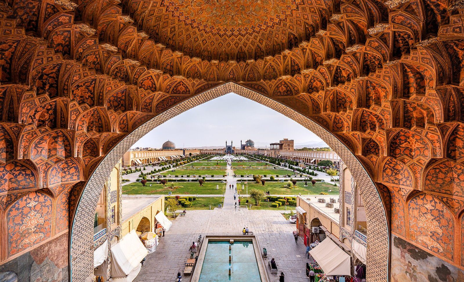 Naqsh-e Jahan Square in Isfahan, seen through the muqarnas vault of the Qeysarieh portal