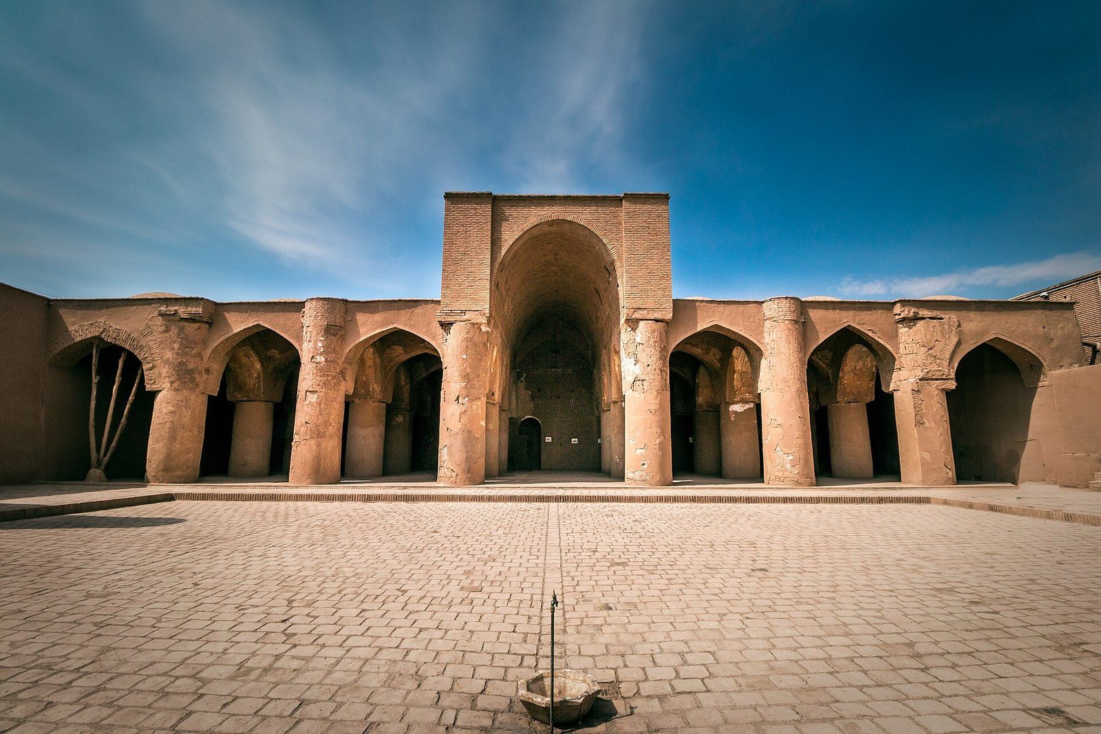 The Tarikhaneh Mosque at Damghan: the courtyard arcade carried on massive round brick piers
