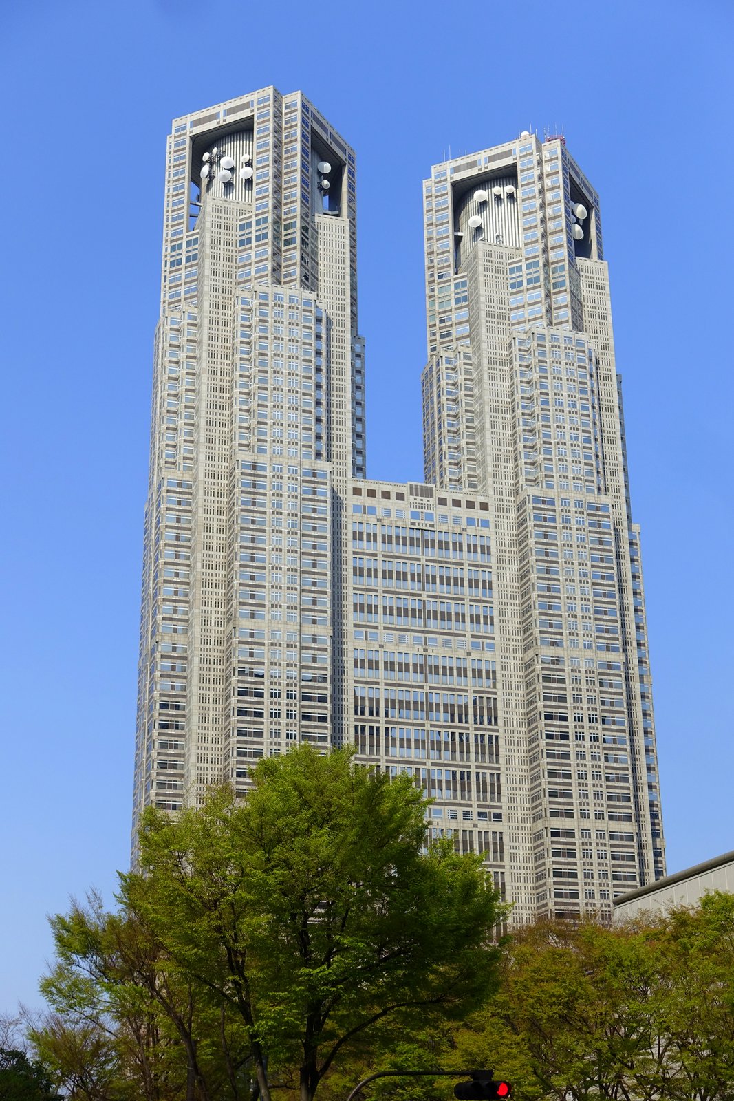 The twin towers of the Tokyo Metropolitan Government Building, with their stepped, cathedral-like tops.