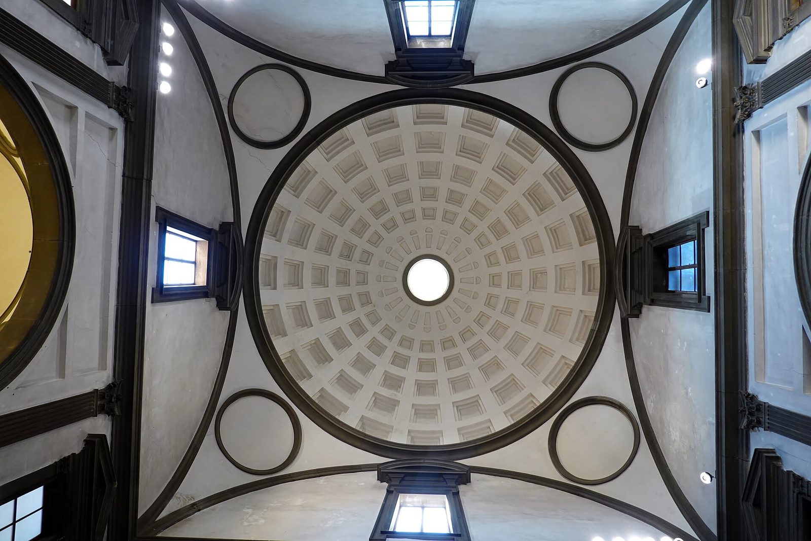 The interior of the Medici Chapel in Florence, Michelangelo's tombs below a dome