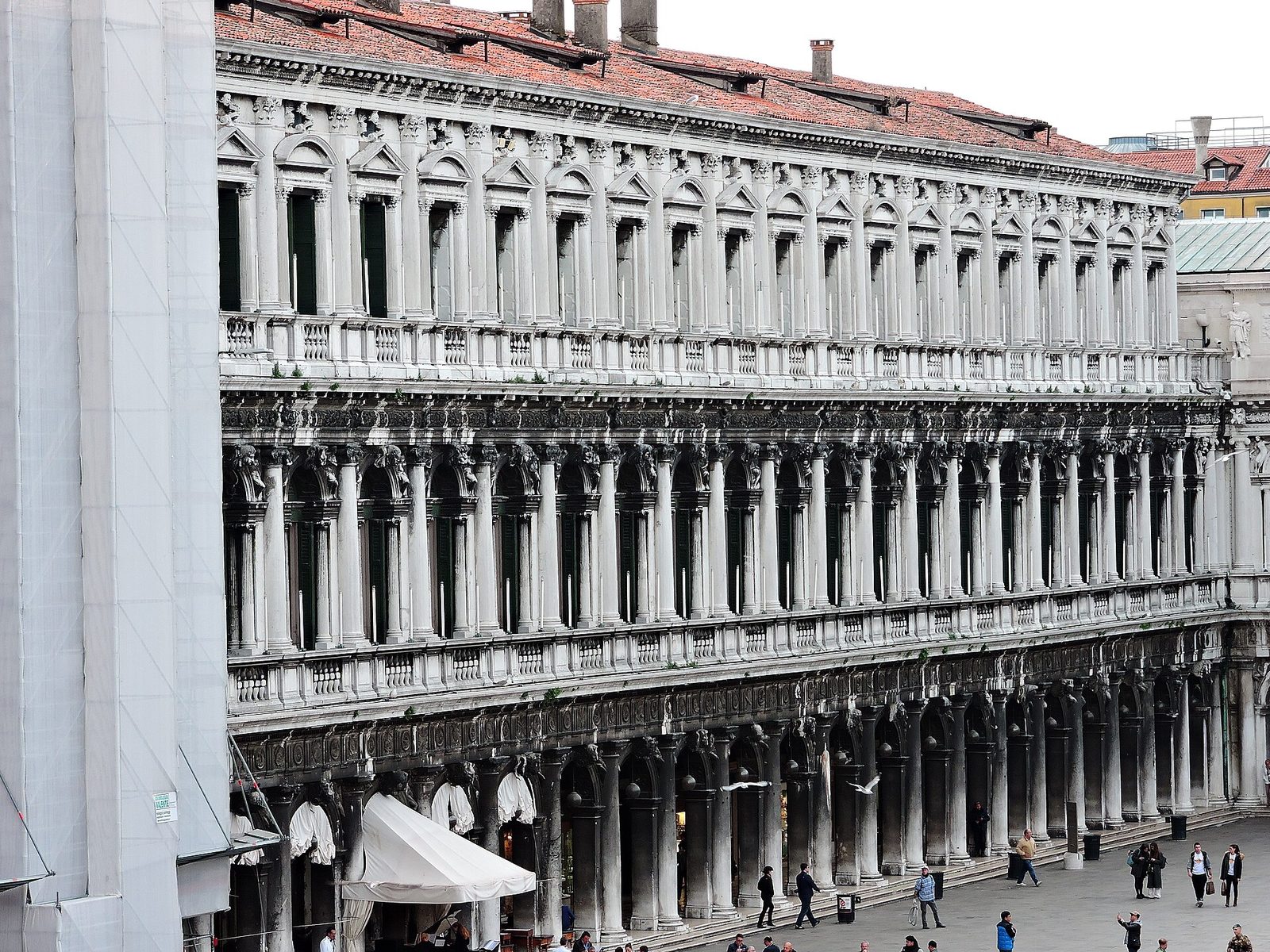 The long arcaded facade of the Procuratie Nuove in Venice