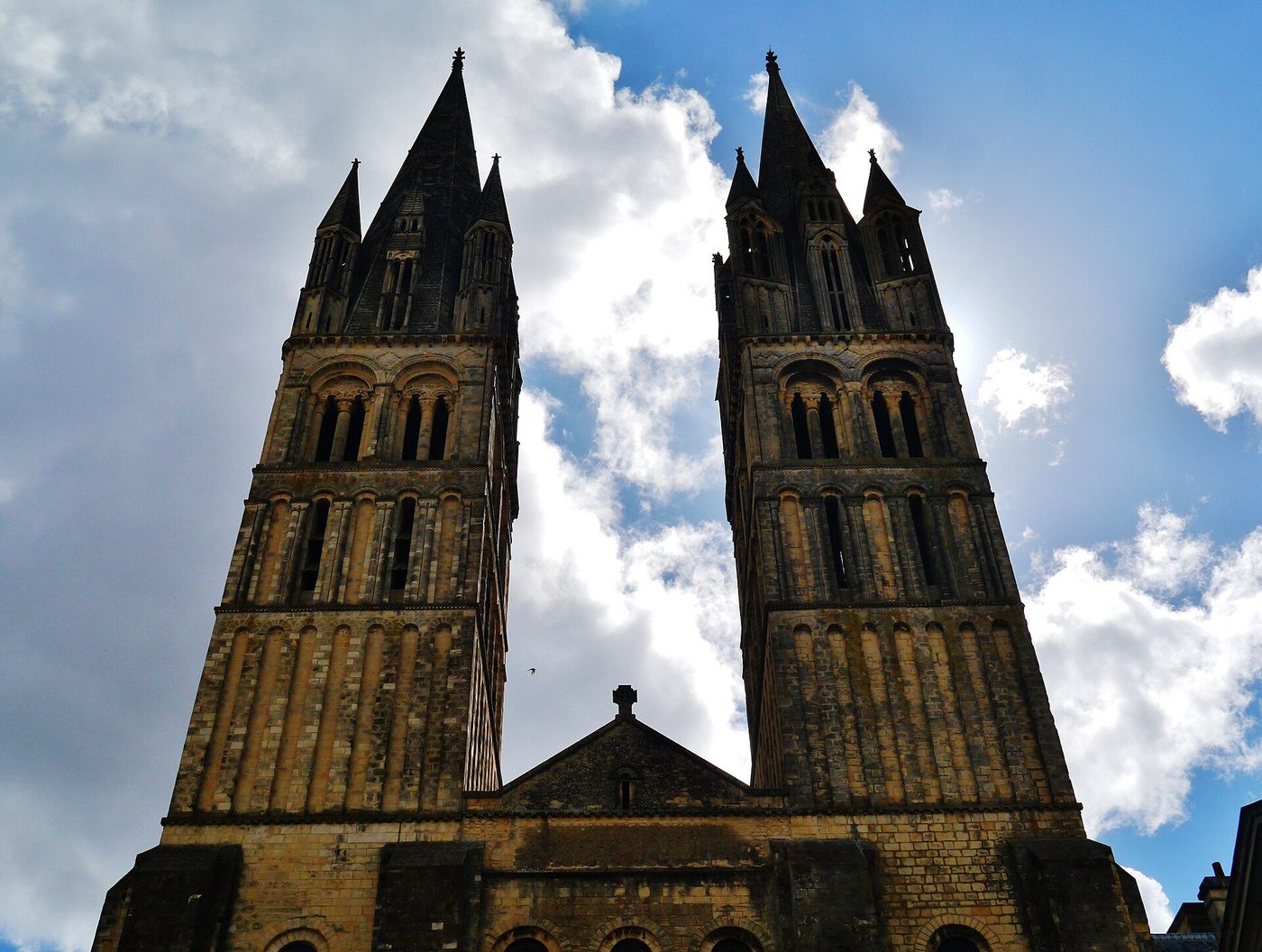 The twin west towers of Saint-Étienne, Caen, seen from below