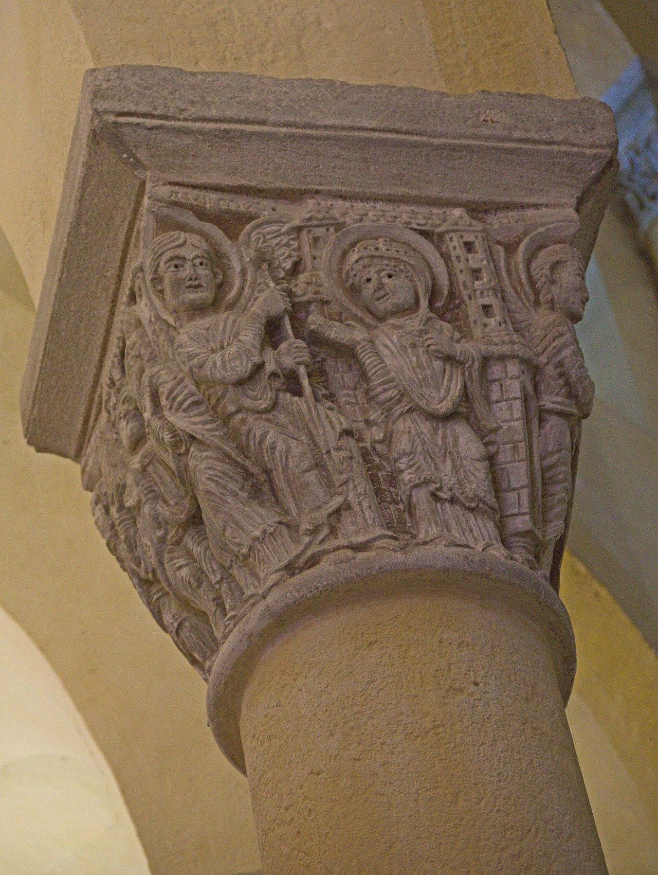 A carved Romanesque capital with figures at Notre-Dame-du-Port, Clermont-Ferrand