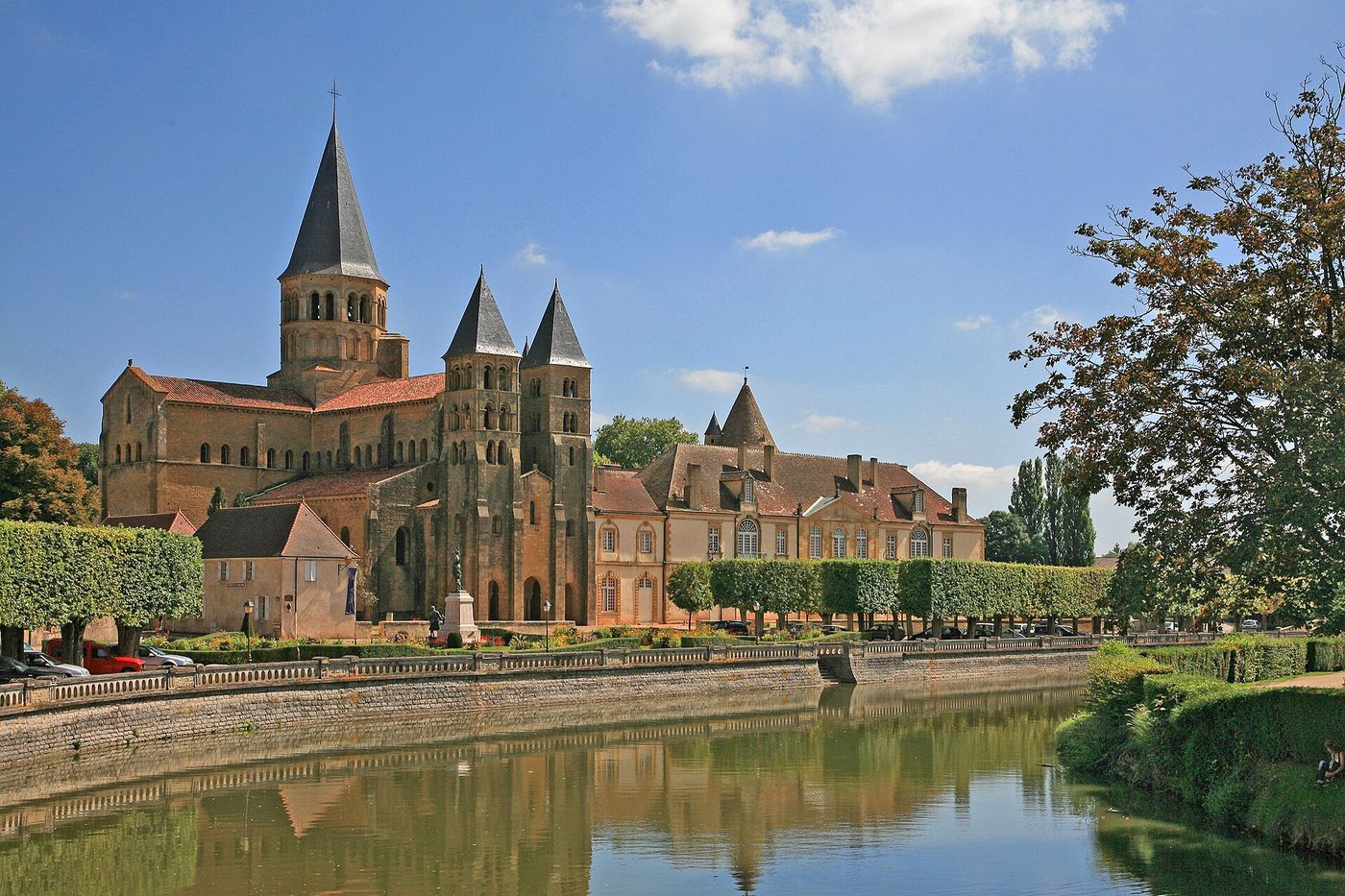 The basilica of Paray-le-Monial seen across the canal
