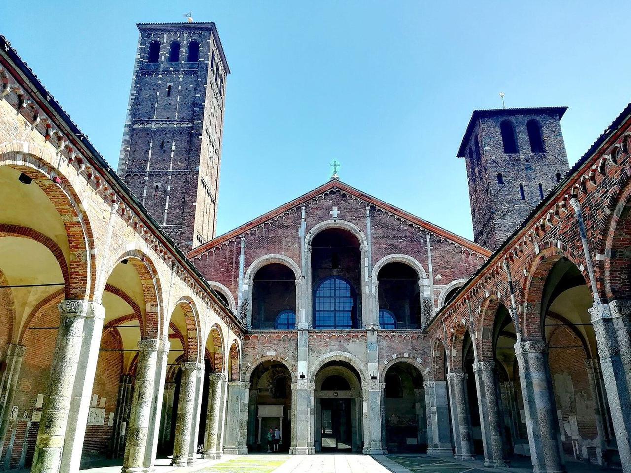 The atrium of Sant'Ambrogio, Milan, with the basilica facade and its two towers