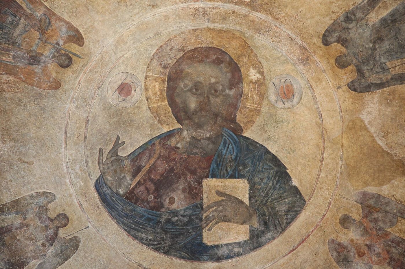 Interior of the main church at Hosios Loukas in Greece, looking up at the dome and its mosaics
