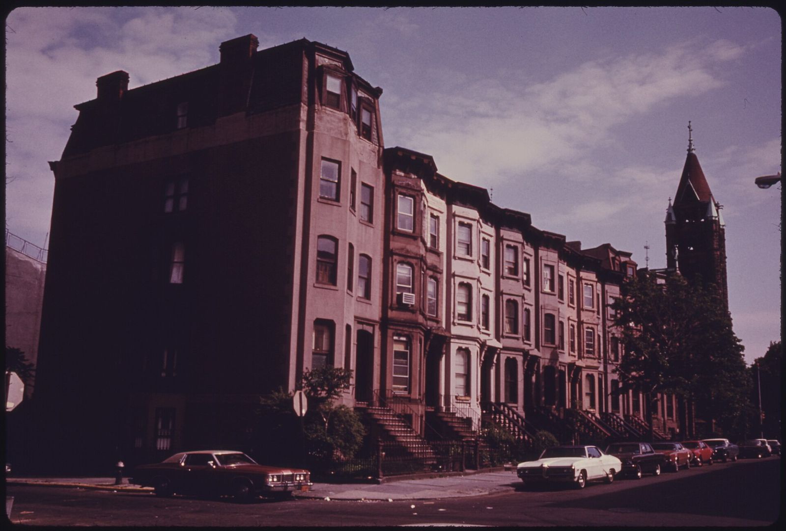 A block of brownstone row houses in Park Slope, Brooklyn, photographed in 1973
