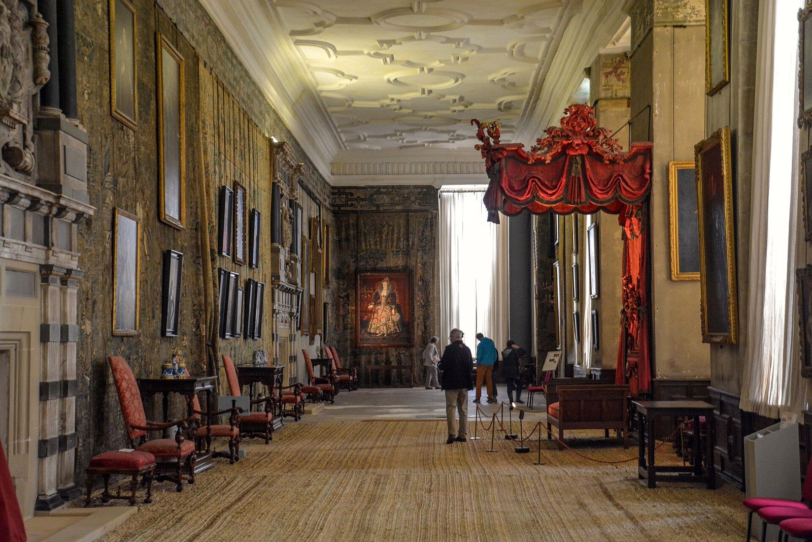 The Long Gallery at Hardwick Hall, with its state canopy and portraits