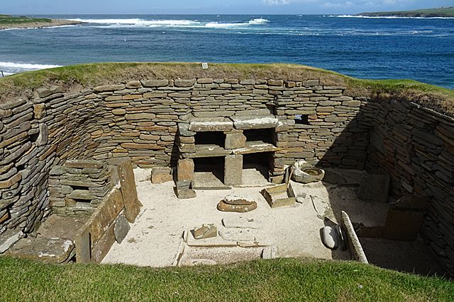 House 7 at Skara Brae in Orkney, seen from above: stone dresser, box beds and central hearth