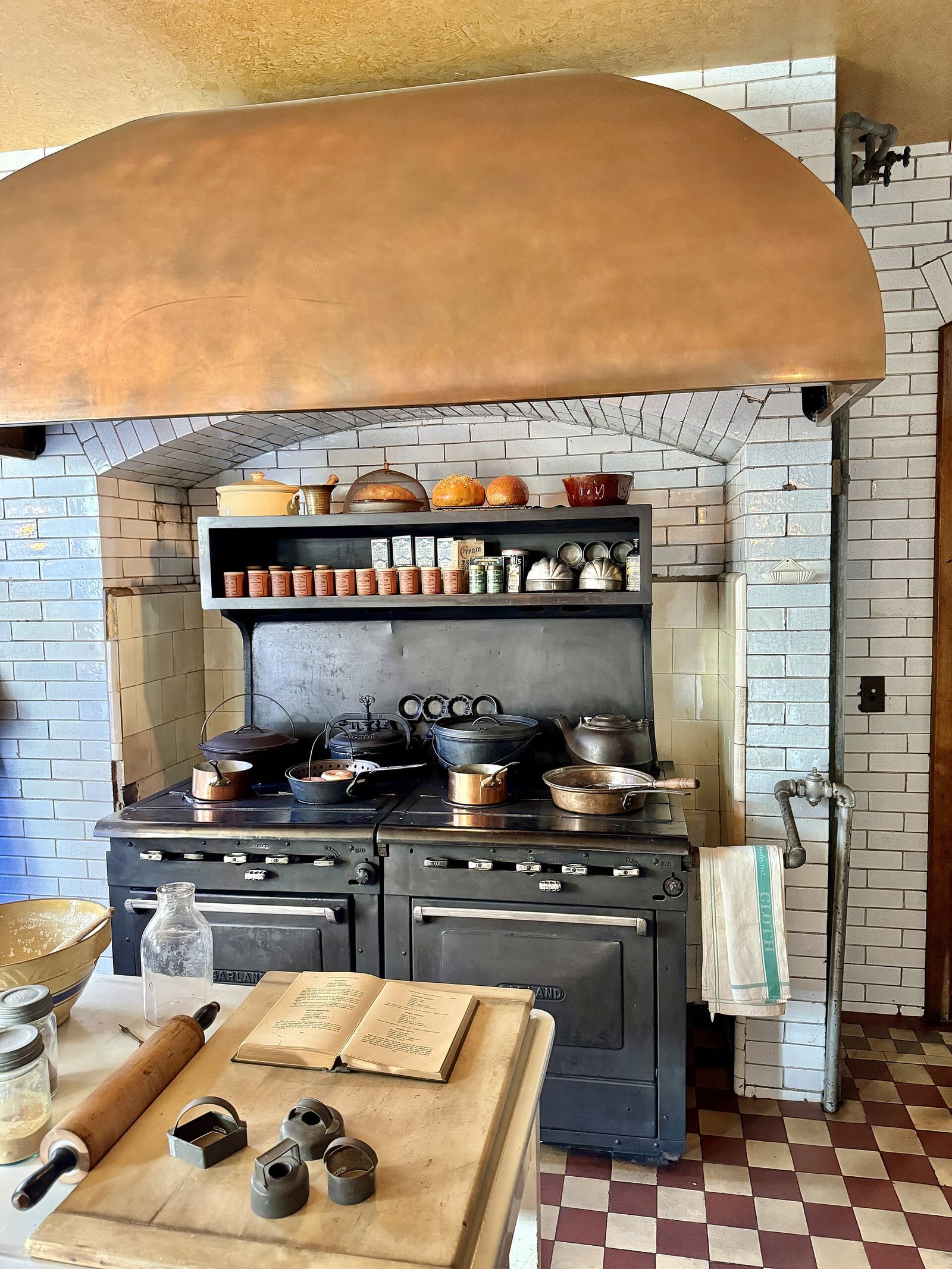 The kitchen of the Glessner House in Chicago, with its great range under a copper hood