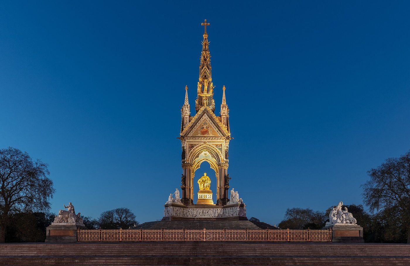 The Albert Memorial at dusk, Kensington Gardens: Scott's gilded Gothic canopy over the seated figure of the Prince