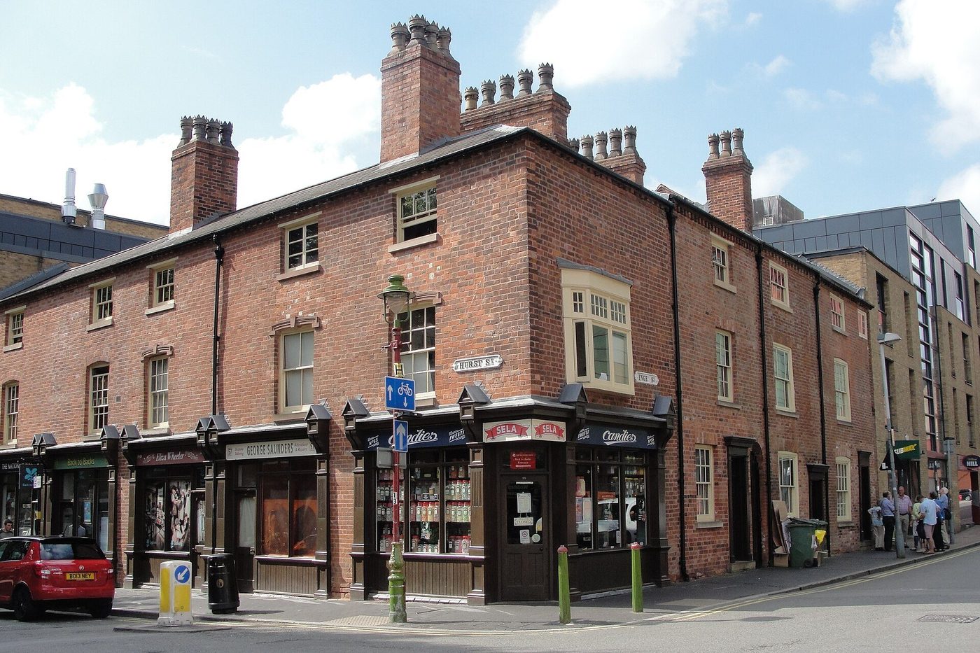 The Birmingham Back to Backs on Inge Street: the brick court houses' street front with its shops