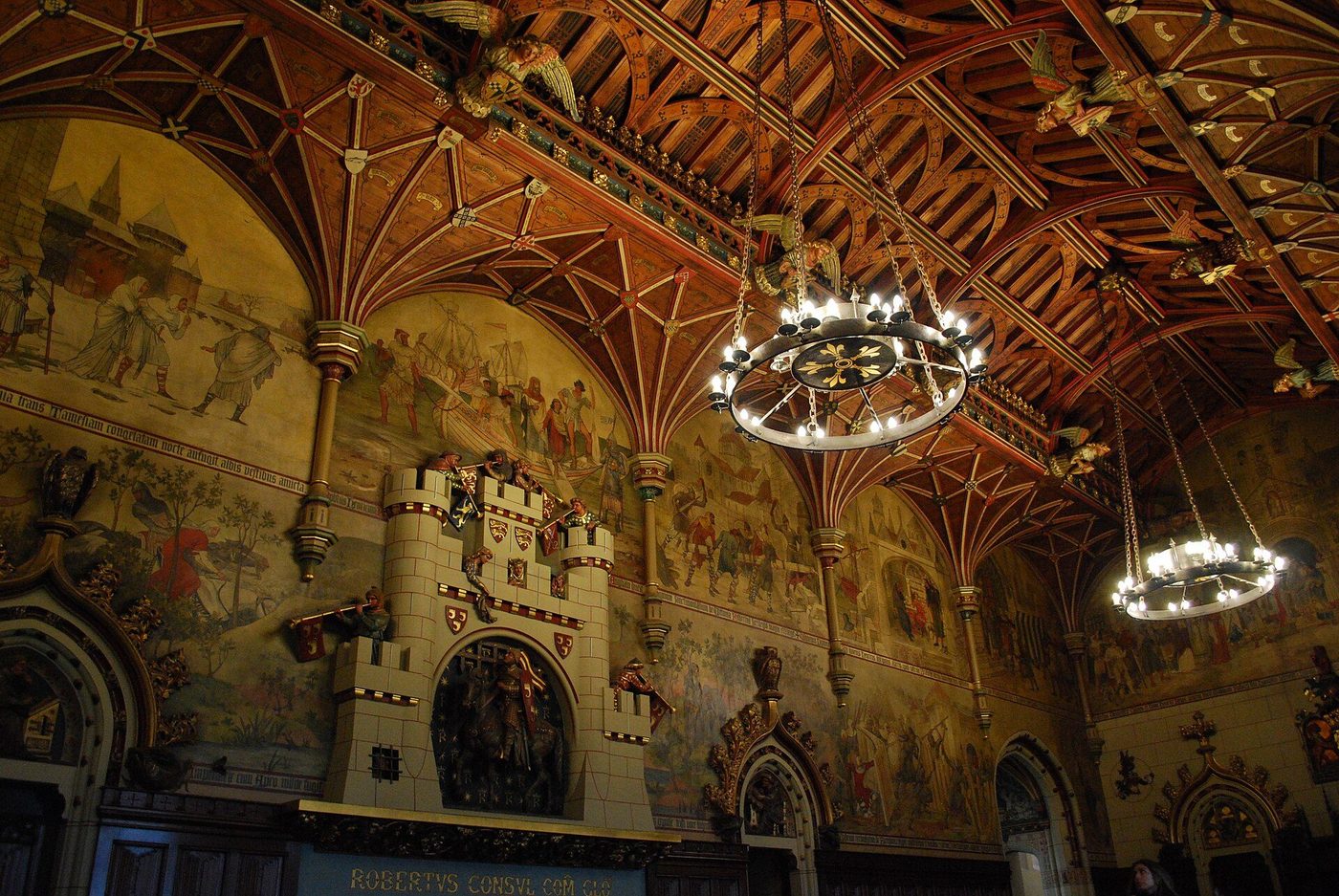The Banqueting Hall at Cardiff Castle: Burges's painted hammerbeam roof, murals and fireplace overmantel castle