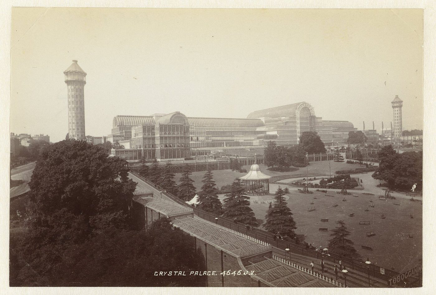 The Crystal Palace re-erected at Sydenham in a period photograph: the glass transepts and the water towers above the terraced park