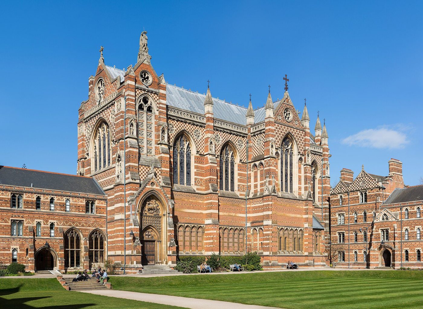 Keble College Chapel, Oxford, by David Iliff: Butterfield's polychrome brick chapel front across the quad