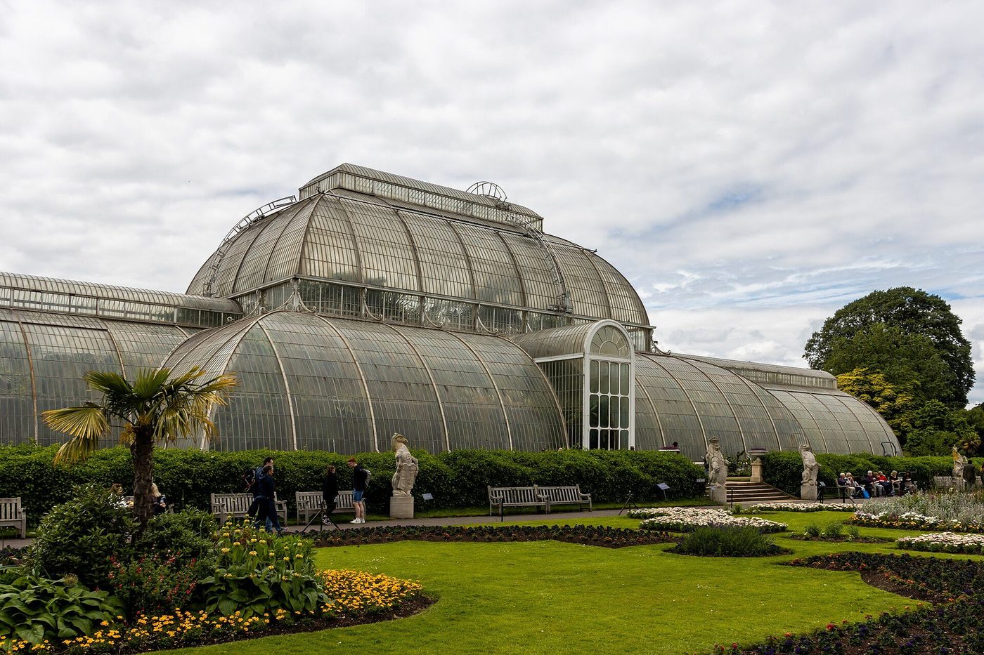 The Palm House at Kew: Burton and Turner's curved iron-and-glass range across the gardens