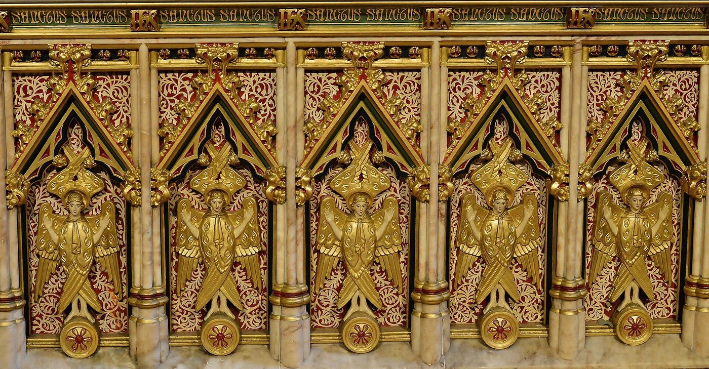 The gilded reredos of St Giles, Cheadle: carved and painted angels in Pugin's richest parish church interior